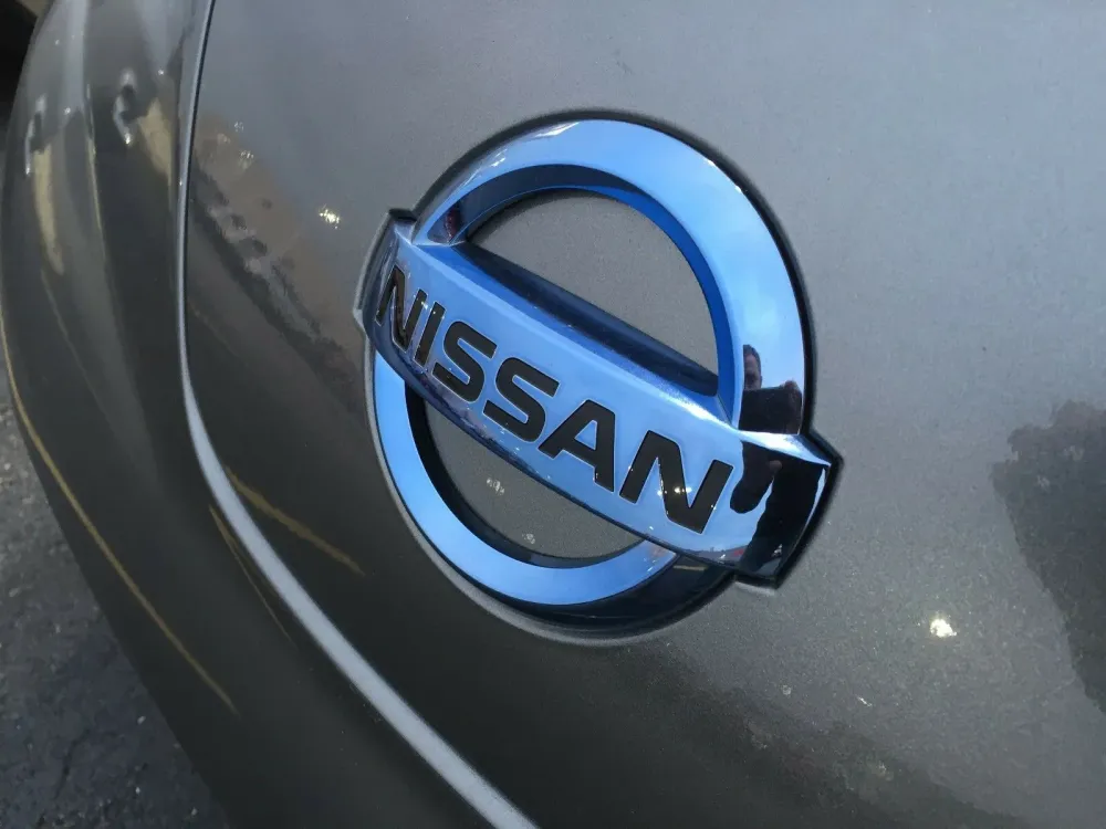 Emblem Nissan Leaf I (ZE0) / Nissan e-NV200 2014 - 2021 | Nissan Motor Company